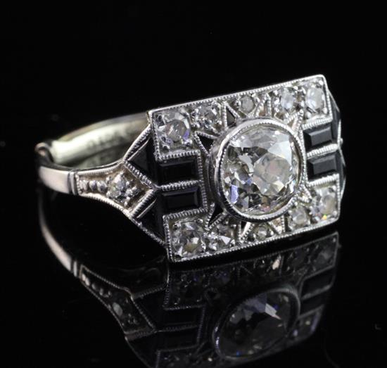 An Art deco white gold, diamond and black onyx tablet cluster ring, size N.